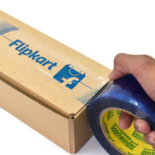 Roll of blue tape with Flipkart lgadgetinpocket.in for shipping purposes.